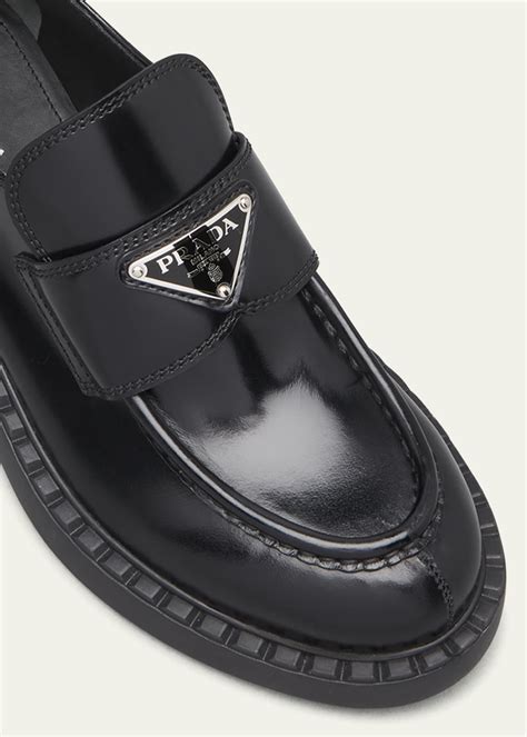 prada triangle logo meaning|prada triangle logo loafer.